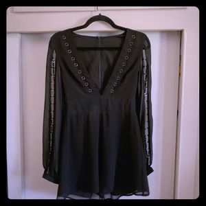 Black romper with silver rings